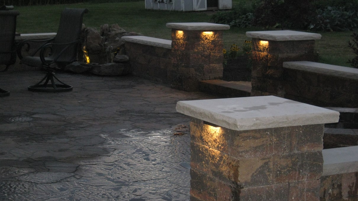 A stone pillars with lights